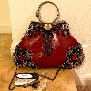 Brand new leather Mary Frances purse        (price negotiable)